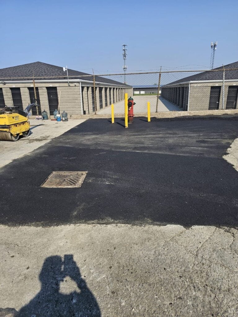 Asphalt patch repair in a parking lot