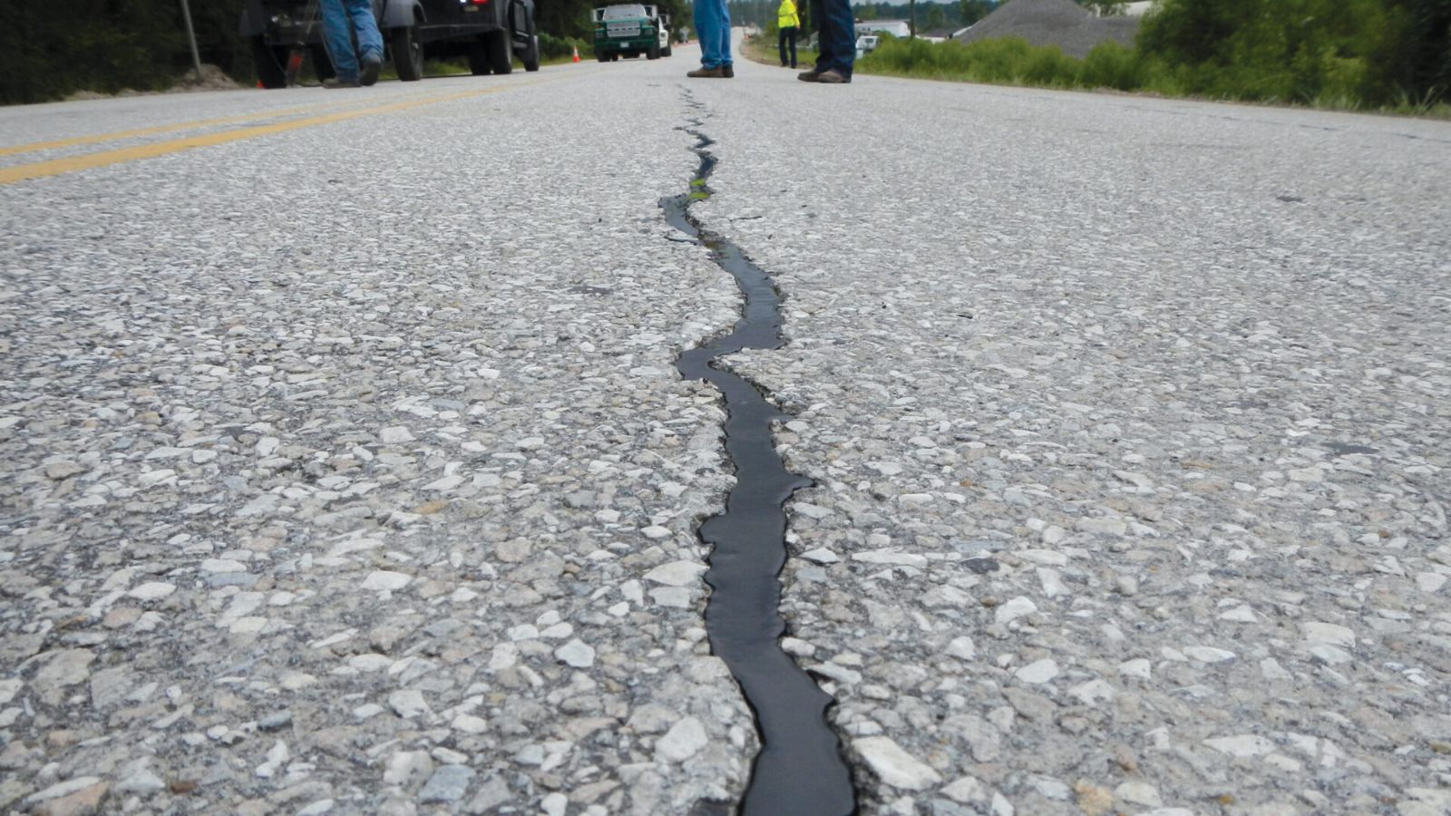 Filled crack in an asphalt road